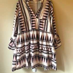 Size XL Pink, Black, and White patterned shirt.